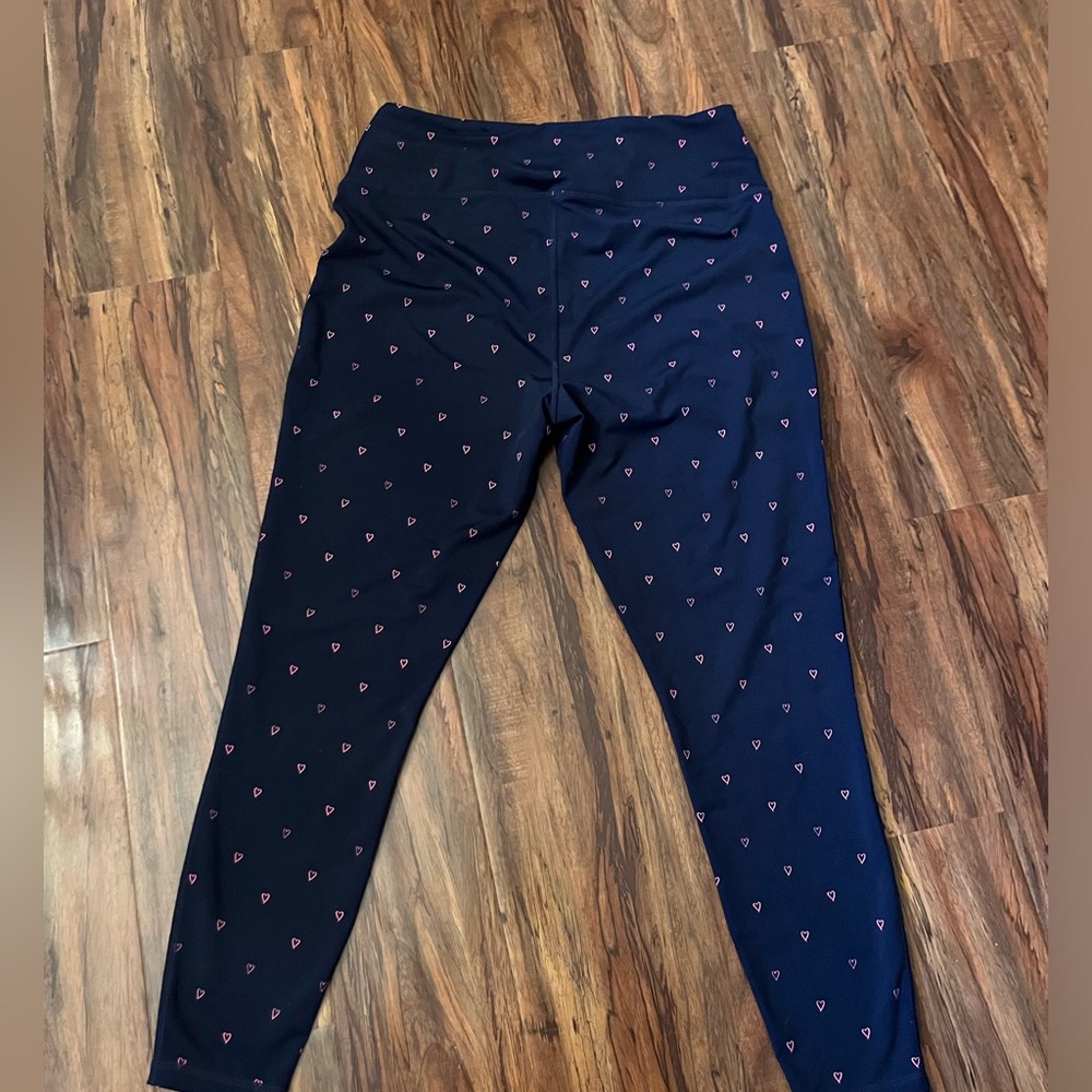 Navy blue leggings with pink hearts
